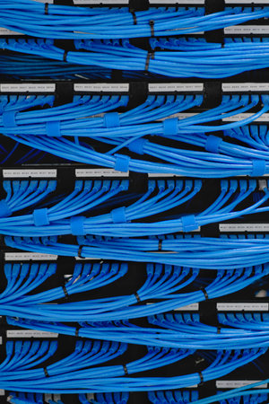 LAN cable wiring and networking in the network or server rack in the data center.