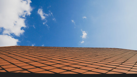 Roof on blue sky background.Concrete ceramic rooftop construction design.Structure texture detail...