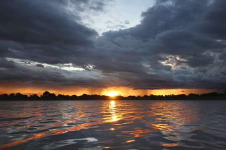 Sunset water reflectionの写真素材