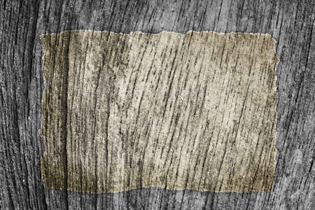Blank old paper on wooden backgroundの写真素材