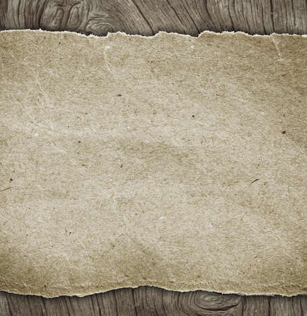 Blank old paper on wooden backgroundの写真素材