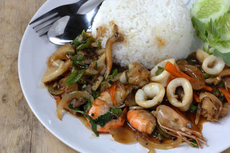 thai sea food spicy with riceの写真素材