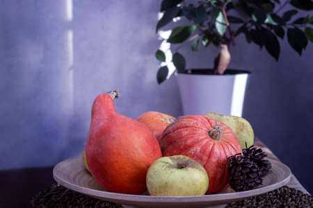 Autumn still life with pumpkins and applesの写真素材