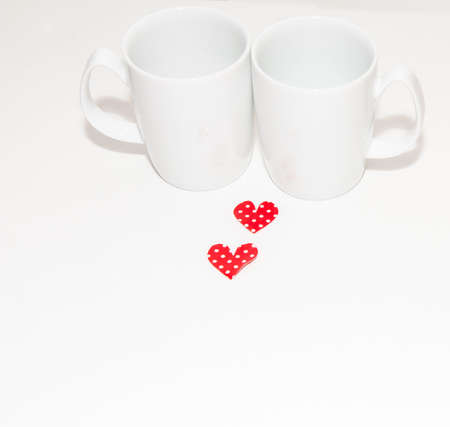 Valentine love mugs with white dots heartsの写真素材