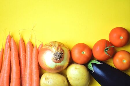 Vegetables set on yellow backgroundの写真素材
