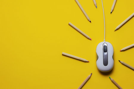 Pc mouse, contour colored pencils, yellow background with space for text