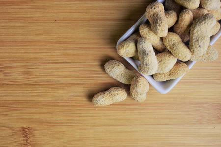 Peanuts on small rectangular porcelain plate