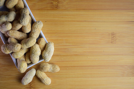Peanuts on small rectangular porcelain plate