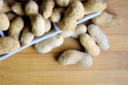 Peanuts on small rectangular porcelain plate