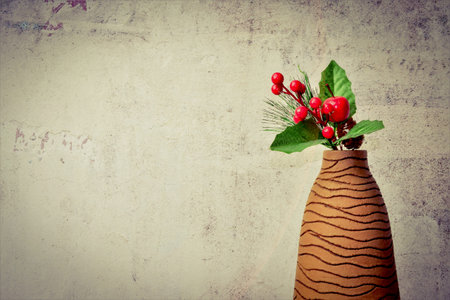 Merry Christmas, mistletoe on top of a brown elongated vase, stone outline, lights and shadows on...