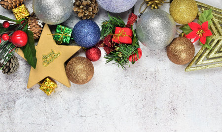 On stone, varied Christmas decoration, with space for text or idea. Merry Christmas.
