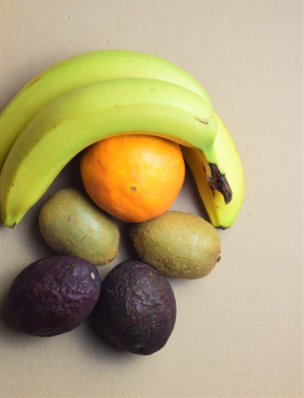 Tropical fruits and orange, on organic basis