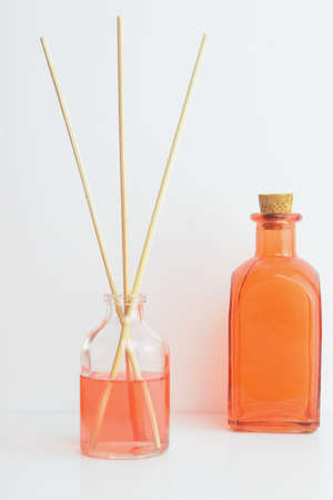 Air freshener, orange tones on white background. Copy space.の写真素材