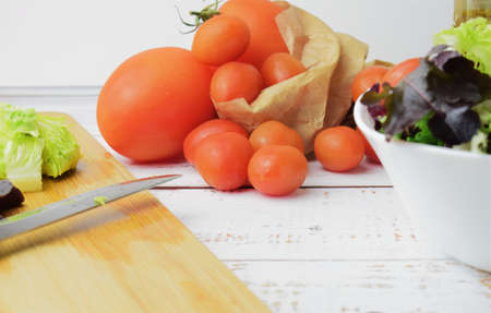 Close up. Tomatoes in ecological paper bag. Copy space.の写真素材