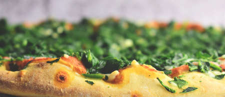Spinach pizza, with mozzarella and tomato. Viewの写真素材