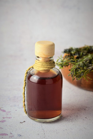 Rosemary in a glass bottle. Natural, with many properties and versatile.