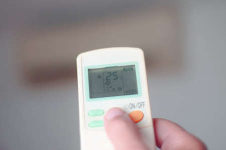 Adjust air conditioning, temperature, ideal in hot months.の写真素材