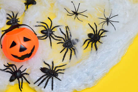 Spiders, decoration, halloween holiday, on yellow background.の写真素材