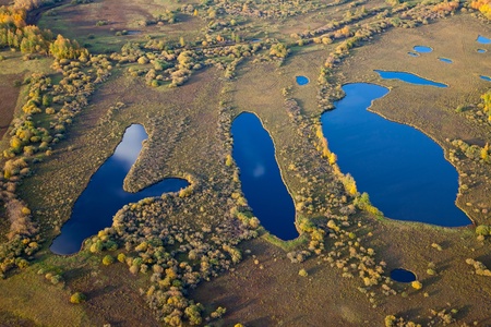 Aerial view of the three lakes in calm weather in the autumnの写真素材