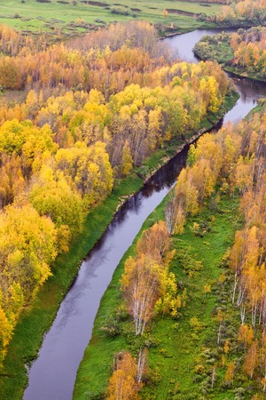Aerial view of the forest lakes during autumn.の写真素材