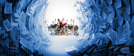 Santa Claus and his deer in Cristmas holidayの写真素材