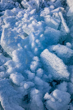 Huge beautiful snowflakes on the ice of Lake Baikal in winterの写真素材