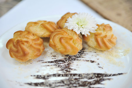 Brewing cakes with flower. Coffee desserts. Delicious dessert with coffee.の写真素材