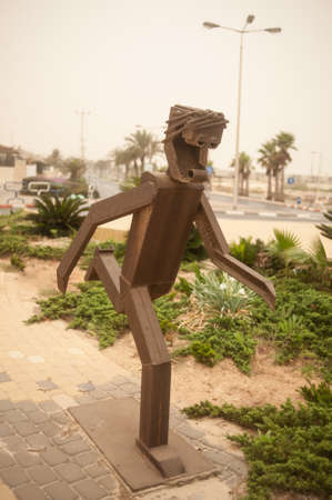 ASHDOD, ISRAEL - SEPTEMBER 08, 2015: Monument along the road during a strong dust storm.のeditorial素材