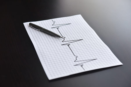 Pulse and business. Business chart and pen. Business concept pen and chart.