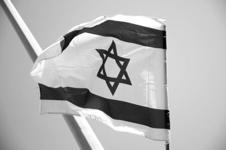 Israel flag, independent day of Israel. Israels flag on a sky.の写真素材
