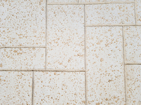 Texture of a big yellow brick wall, backgrounds.