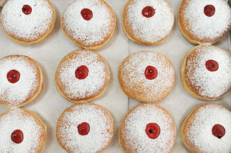 Hanukkah symbol jewish food holiday image of donut with jelly and sugar powders.の写真素材