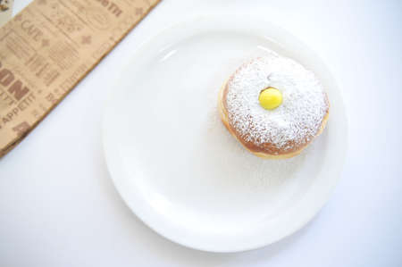 Hanukkah symbol jewish food holiday image of donut with egg jelly and sugar powders.の写真素材