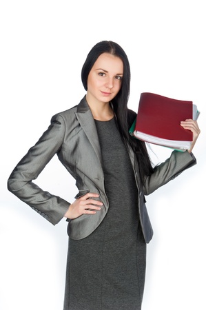 young beautiful businesswoman holding folders,isolated on whiteの写真素材