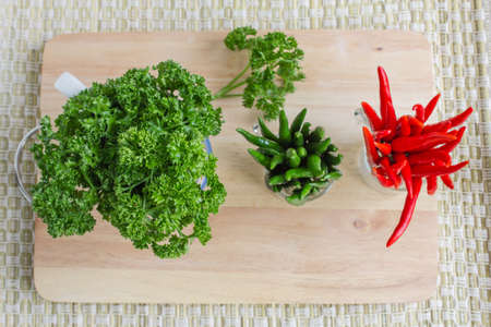 Green and red pepper isolatedの写真素材