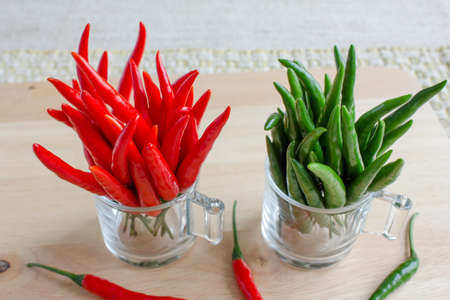 Green and red pepper isolatedの写真素材