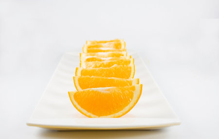 Slices of Orange Isolated on White Background 