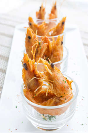 Fried prawn balls placed on the glassの写真素材