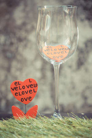 vintage red hearts in Empty wine glass  Happy valentine day の写真素材
