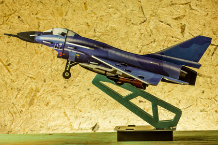 toy jet on vintage old paper background
