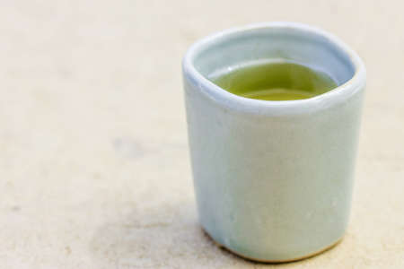 Japanese green tea in a ceramic cupの写真素材