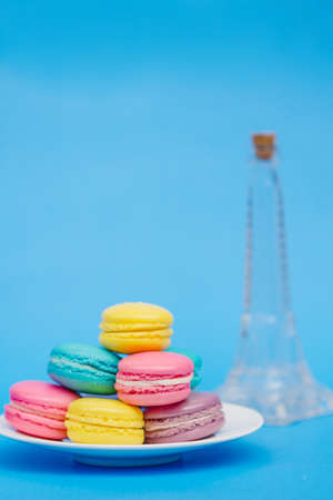 Sweet and colourful french macaroons on retro-vintage backgroundの写真素材