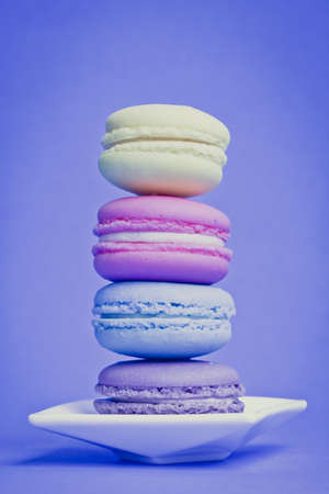 Sweet and colourful french macaroons on backgroundの写真素材