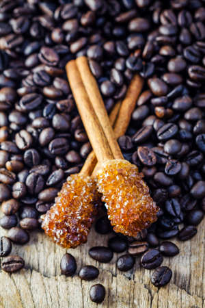 Sugar Stick Cinnamon and coffee bean on wooden tableの写真素材