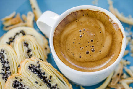 Cup of espresso coffee and Butterfly Pieの写真素材