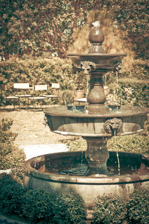 The fountain multi tiered in the gardenの写真素材