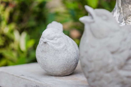Statues two birds in gardenの写真素材