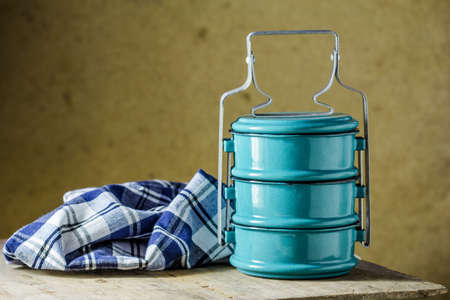 metal Tiffin carrier, thai food carrier on brown backgroundの写真素材