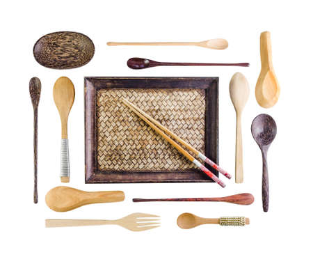 Set of the wooden kitchen utensils on a white table backgroundの写真素材