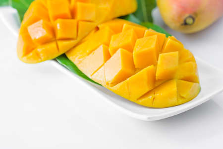 fresh mango fruit isolated on white backgroundの写真素材